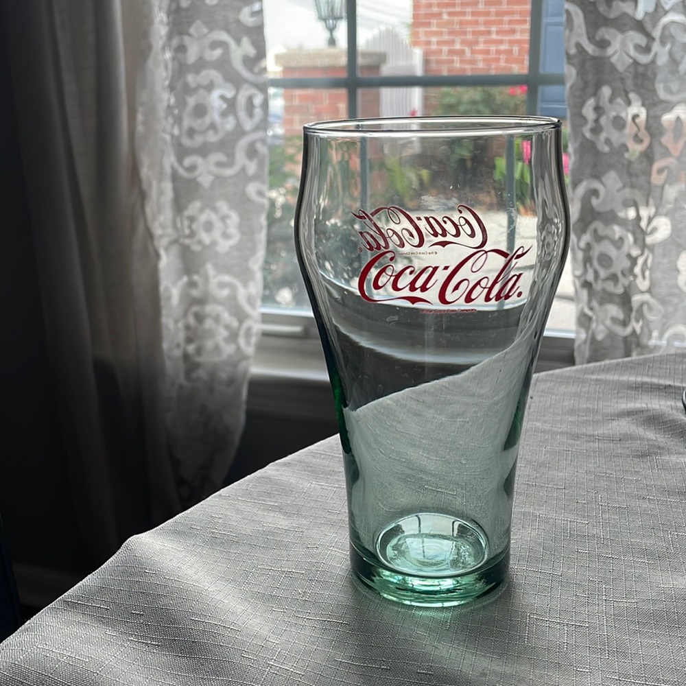 Rare Coca-Cola glass, clear green glass with red logo, 6.75 inches tall.